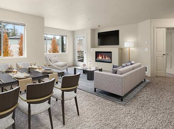 A living room with a fireplace and a dining table set for six.
