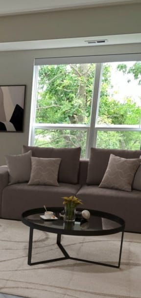 a living room with a couch and a table