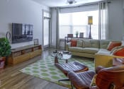 Thumbnail 2 of 54 - Living Room with Private Patio Access at 4700 Colonnade Apartments in Birmingham, AL