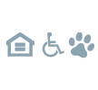 a house with a wheelchair parked next to it on the side of the road