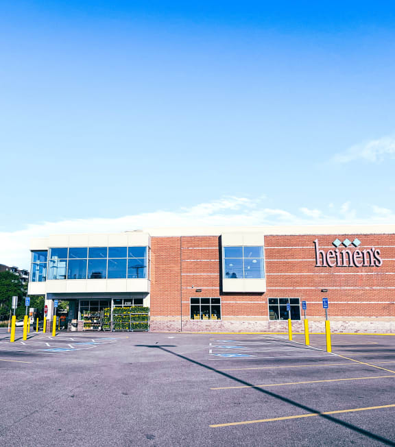heinen's grocery store parking lot in front of the brick building at Huntington Green Apartments, University Heights, 44118