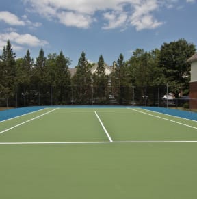 a tennis court with a blue and green court with white lines on it