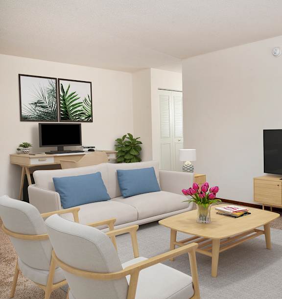 A living room with a white couch, a wooden coffee table, and a flat screen TV.