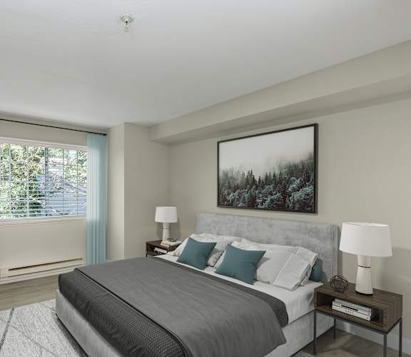 a bedroom with a large bed and a large window