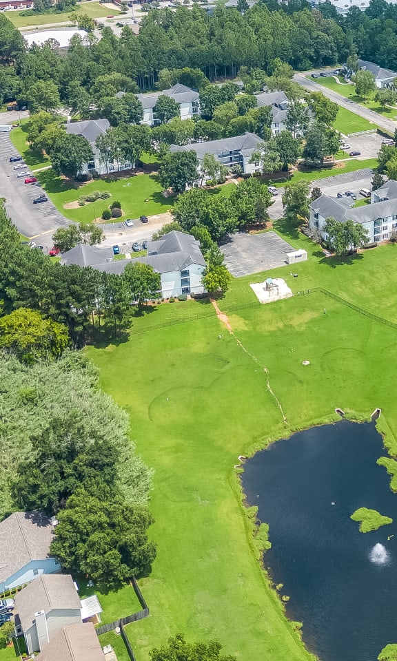 an aerial view of the campus with a lake in the foreground at Dothan Farms, Dothan, AL, 36305