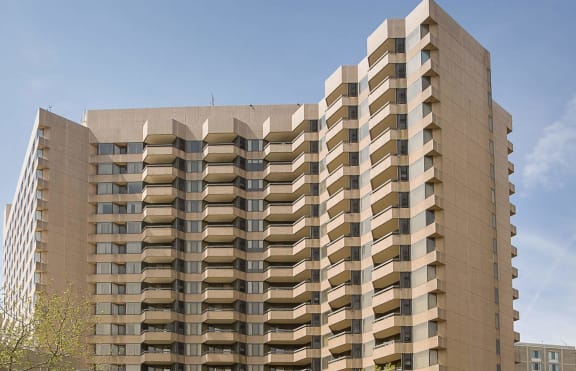 a view from the street of a large apartment building