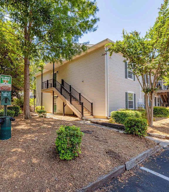 a conference room with a table and chairs and a tv at Sanctuary Apartments & Townhomes, Augusta