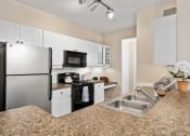 Thumbnail 2 of 41 - Kitchen  at The Park at Monterey Oaks, Austin, TX