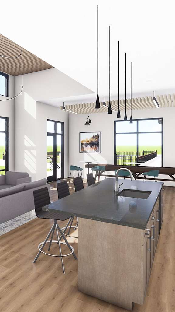 A room with a desk, chair, and a window overlooking a field.