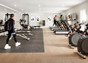 Thumbnail 3 of 7 - Gym with Treadmill at Woodland Place Apartments, Langford, BC