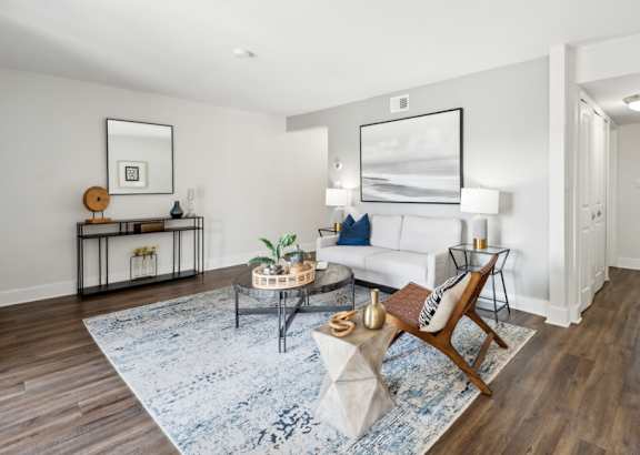 a living room with a couch and a coffee table at Linkhorn Bay Apartments, Virginia Beach, VA, 23451