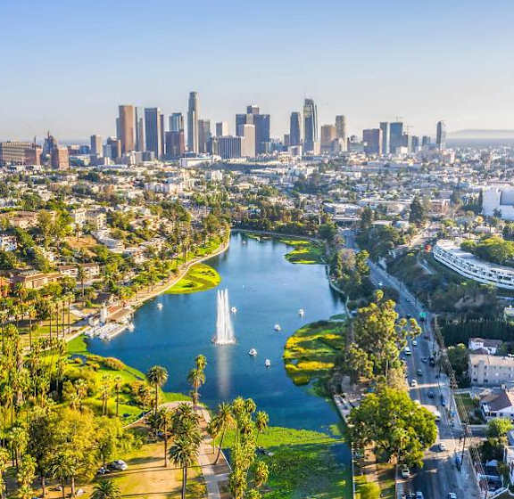 A cityscape with a river running through it.