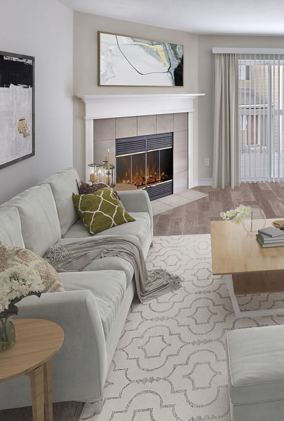 a living room with a fireplace and chairs and a table at Arterra Apartments, Kent, WA