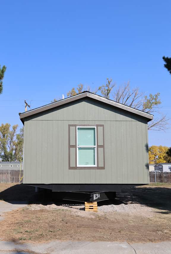 the exterior of a tiny house on a trailer at Kimberly Village, Wyoming