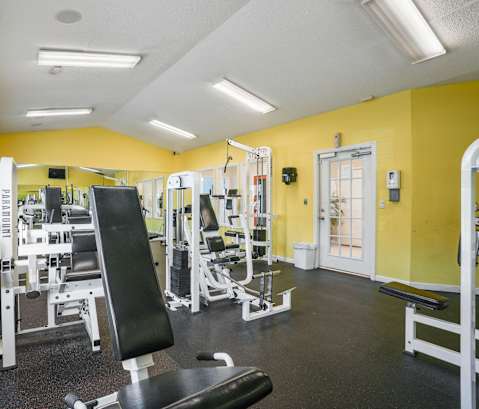 a fitness room with weights and cardio equipment  at Cape Landing, Myrtle Beach, SC, 29588