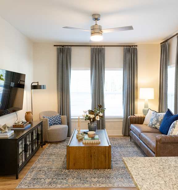 Modern Living Room with TV at The Crest at Oakwood, Oakwood, GA