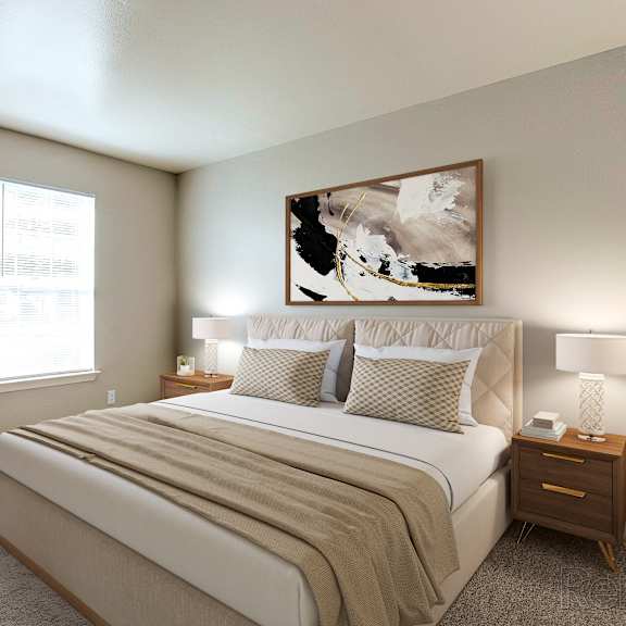A bedroom with a large bed, a potted plant, and a painting on the wall.