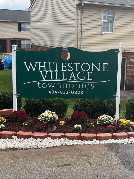 Photo of the whitestone village townhomes sign