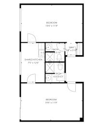 A floor plan of an apartment with two bedrooms, a shared kitchen, and two bathrooms.