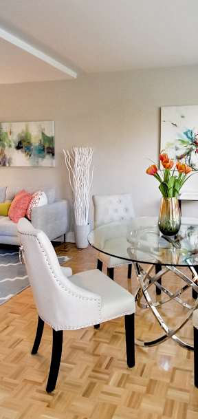 a living room with a couch and a large window