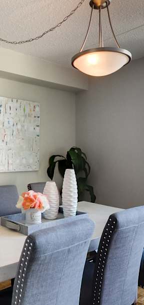 a living room with a couch and a large window