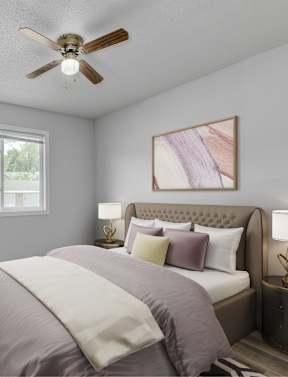 A bedroom with a bed, pillows, a ceiling fan, and a window.at Fish Creek, Norwalk, IA 50211