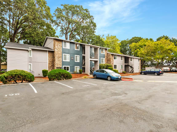 Cornell Wood apartments exterior building entryways and parking lot
