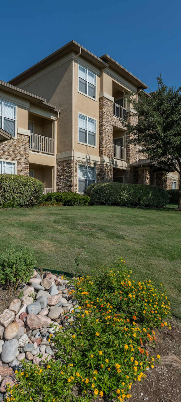 Exterior of apartment complex at Woodbridge Villas Apartments, Sachse