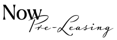 A sign that says "Pre-Leasing coming soon" in black text on a white background.