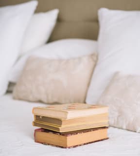 Books near pillows